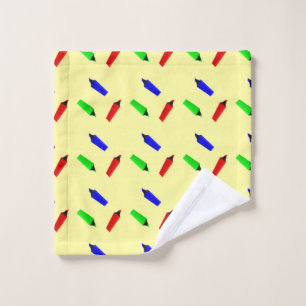 Colorful highlighters on yellow wash cloth