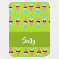 Colorful ice creams on green baby blanket