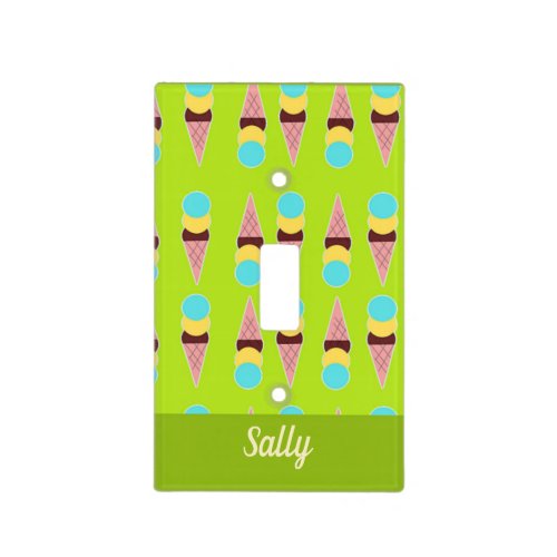 Colorful ice creams on green light switch cover