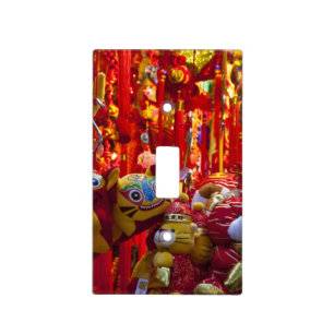 Colorful items for sale in a shop in Hong Kong Light Switch Cover