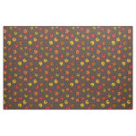 Colorful ladybugs on brown fabric
