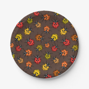 Colorful ladybugs on brown paper plates
