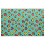 Colorful ladybugs on turquoise fabric