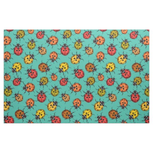 Colorful ladybugs on turquoise fabric