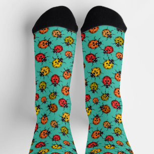 Colorful ladybugs on turquoise socks