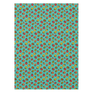 Colorful ladybugs on turquoise tablecloth