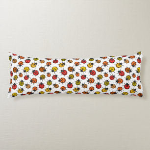Colorful ladybugs on white body pillow