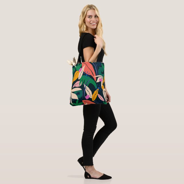 Colorful leaf pattern, vibrant tote bag (On Model)