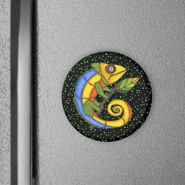 Colorful Lizard on a Branch Magnet (Colourful fantasy lizard holding twig with leaf green polka dots on black round magnet.)