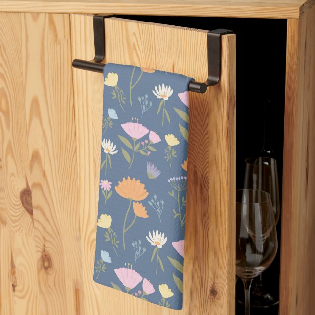 Colorful meadow on blue kitchen towel (Thirds Fold)
