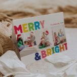 Colorful Merry and Bright Folded Three Photo Holiday Card<br><div class="desc">Capture the joy and magic of the holiday season with this unique and festive, colorful merry and bright folded three photo holiday card. Its simple yet fun design features a rainbow color palette of red, green, yellow, blue, orange, and pink, creating a vibrant and cheerful atmosphere. The creative and minimalist...</div>