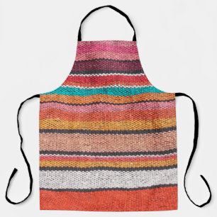 Colorful mexican, peruvian style rug surface close apron