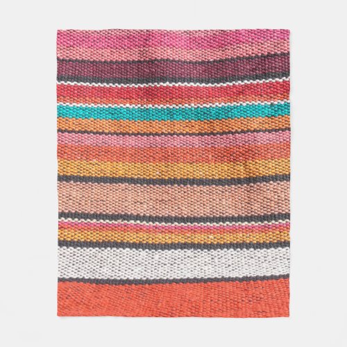Colorful mexican peruvian style rug surface close fleece blanket