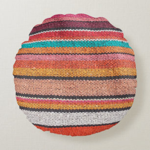 Colorful mexican, peruvian style rug surface close round pillow
