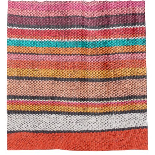 Colorful mexican peruvian style rug surface close shower curtain
