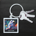 Colorful Modern Astronaut Space Personalized Name Keychain<br><div class="desc">Colorful Modern Astronaut Space Personalized Name Keychain features an astronaut floating though outer space with colorful planets and swishes and personalized with your name in modern script typography. Perfect as a gift for space lovers, family and friends for birthday, Christmas, holidays, Father's Day, brother, husband, partner, best friends, work colleagues...</div>