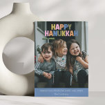 Colorful Modern Hanukkah Greeting 2 Photo Holiday Card<br><div class="desc">Celebrate the season with this cheerful modern Hanukkah card design in a playful rainbow of pastel colors overlaying your family photo. “Happy Hanukkah” is boldly featured in chunky multicolored letters,  paired with a sweet message of love,  lights,  and latkes below. A fun,  stylish way to share Hanukkah joy.</div>
