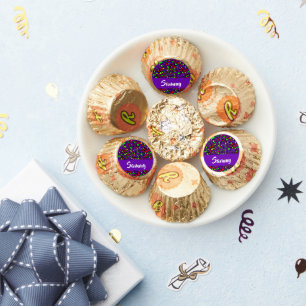 Colorful musical notes on purple reese's peanut butter cups