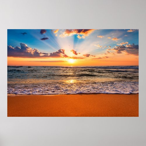 Colorful ocean beach sunrise with deep blue sky an poster