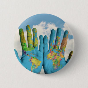 Colorful Painted World Map in Hands, Art Photo Button