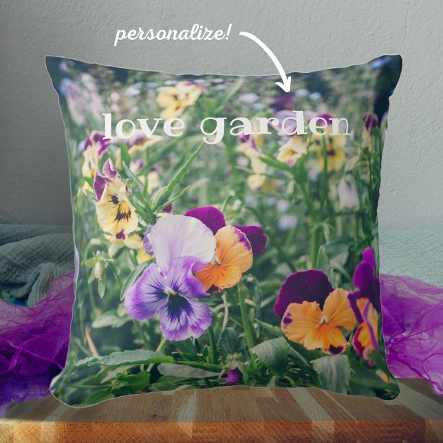 Colorful pansies in a summer country garden throw pillow (Creator Uploaded)