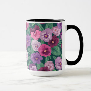 Colorful pansies on dark greenish blue mug