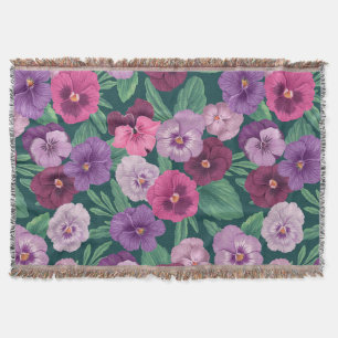 Colorful pansies on dark greenish blue throw blanket