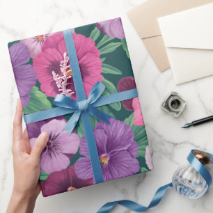Colorful pansies on dark greenish blue wrapping paper