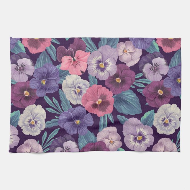 Colorful pansies on deep violet kitchen towel (Horizontal)