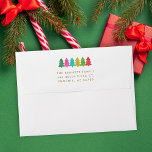 Colorful Paper Trees Pre-Addressed Christmas  Envelope<br><div class="desc">Go bold and add a touch of fun to your holiday mailings with these colorful, modern styled envelopes, which are pre-addressed for your convenience! The back flap features a line of slightly overlapping tissue paper Christmas trees in festive colors of red, green, lime, aqua blue, pink, and golden yellow. The...</div>