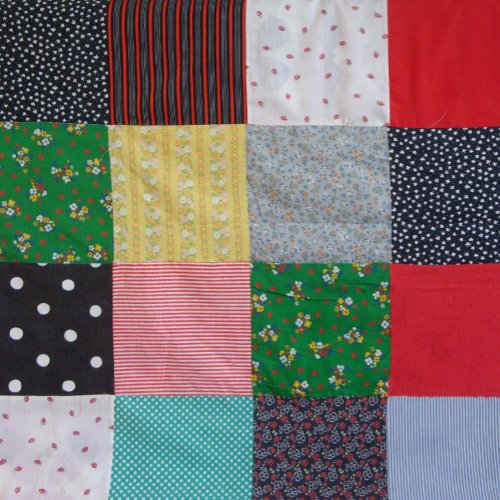 colorful patterned squares of patchwork for dog swaddle blanket