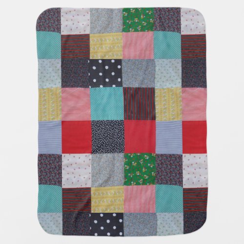 colorful patterned squares of vintage patchwork stroller blanket