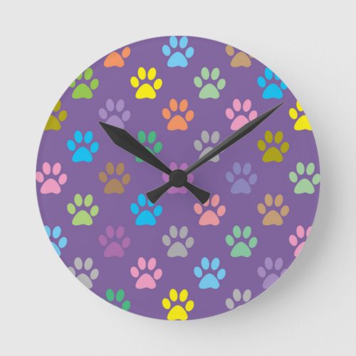 Colorful paw prints pattern round clock