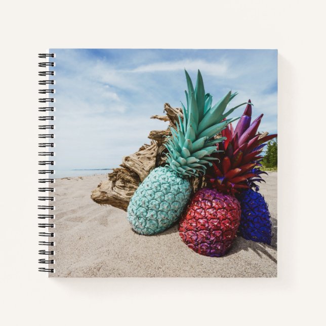 Colorful Pineapples on a Sandy Beach Notebook (Front)