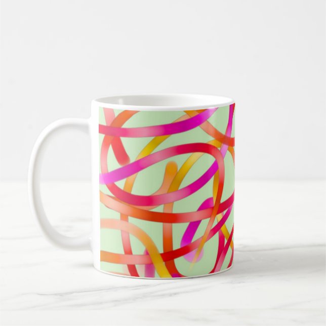 Colorful pink and orange abstract design coffee mug (Left)