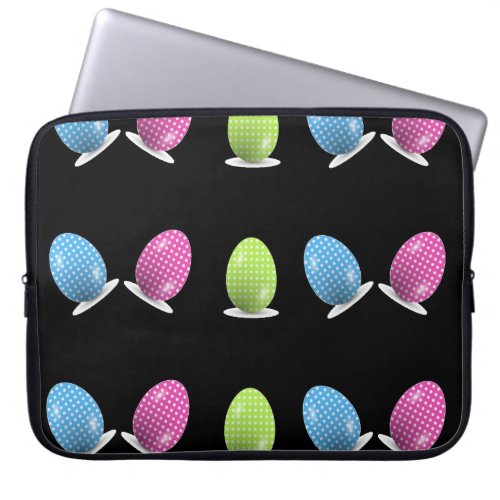 Colorful polka dots eggs on black laptop sleeve