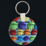 Colorful Protection Key Ring<br><div class="desc">Umbrellas galore, and so colorful. Blue, red, orange, yellow and green umbrellas - we have them all in this image. Some people love walking in the rain but although walking in the rain can be fun (particularly when it hasn’t rained for a long time as can happen in Australia in...</div>