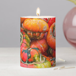 Colorful pumpkins pillar candle