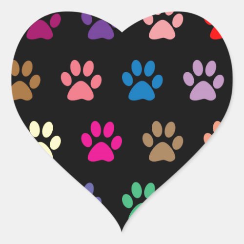 Colorful puppy paw prints on black heart sticker