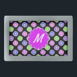 Colorful Retro Flower Pattern Monogram Belt Buckle<br><div class="desc">This pretty, girly design features a bright, colorful floral pattern in shades of pink, purple, blue and green on a black background. It has a flower - shaped space in orchid - purple where you can add your monogram / initial in white to personalize. It's a slightly retro, very chic...</div>