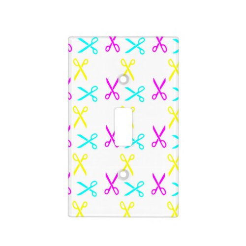 Colorful scissors on white light switch cover
