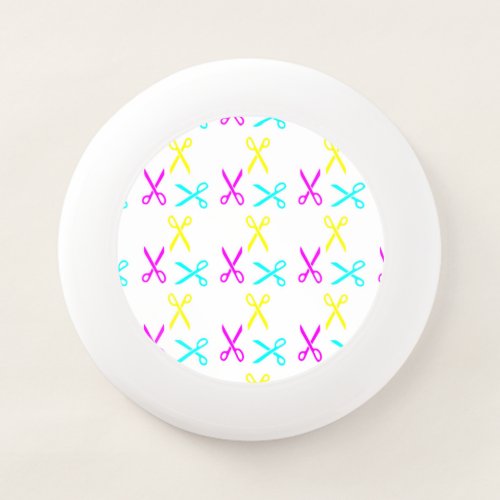 Colorful scissors on white Wham_O frisbee