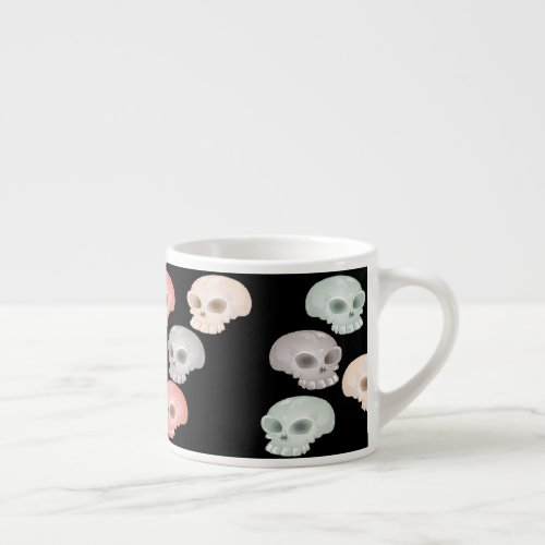 colorful skulls on black espresso cup
