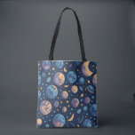Colorful Space Themed Tote Bag<br><div class="desc">With this stunning space-themed pattern,  you can bring the wonders of the cosmos to your life! This is the perfect addition to any space enthusiast's collection,  with its mesmerizing pattern of planets,  twinkling stars,  and colorful moons.</div>