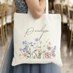 Colorful Spring Wildflower Meadow Garden Wedding  Tote Bag<br><div class="desc">Capture the beauty of nature on your special day with our exquisite wildflower watercolor bride tote bag. Elegant, unique, and blooming with love. Use the text fields to personalize your design with your own wording and details. If you want to change the font style, color or text placement, simply click...</div>