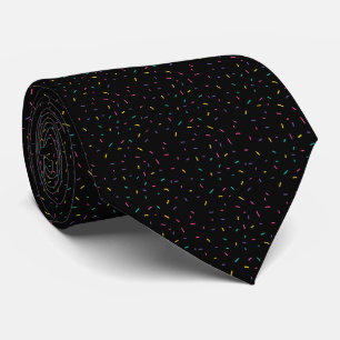 Colorful sprinkles on black background neck tie
