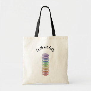 Colorful stack of sweet macarons: la vie est belle tote bag