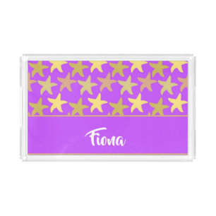 Colorful starfish on purple acrylic tray