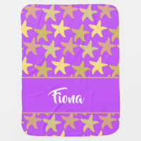 Colorful starfish on purple baby blanket