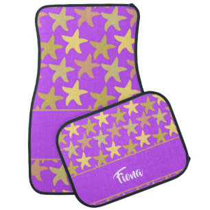 Colorful starfish on purple car floor mat